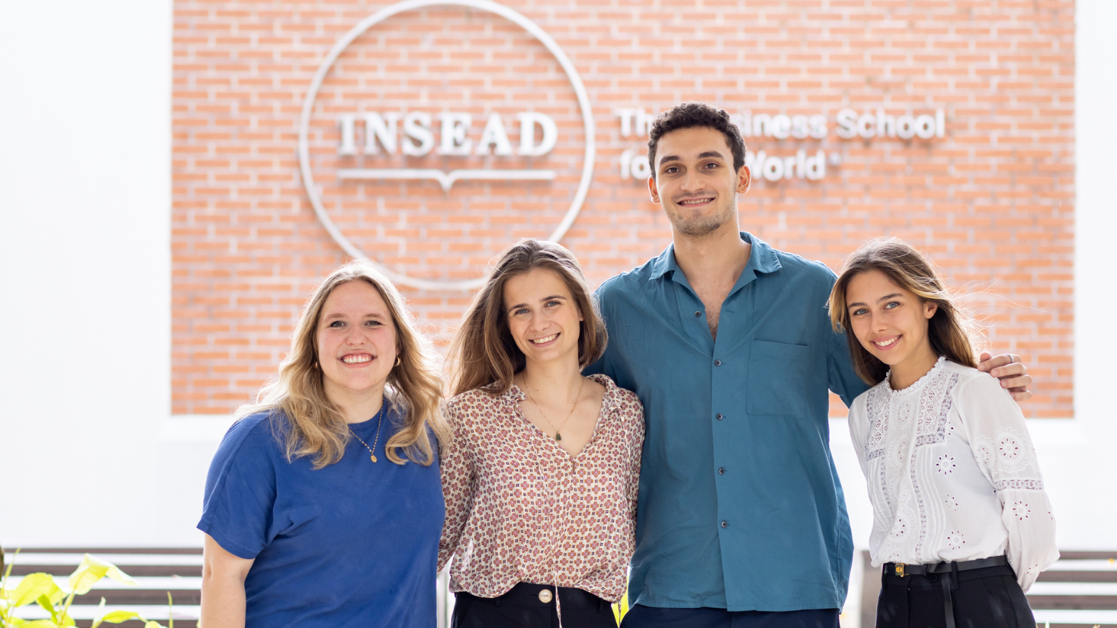 INSEAD Master in management (MIM) students taking a group photo in the Singapore campus in Asia