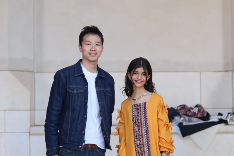 Levin with a costume model in the Al Alam Palace, Oman