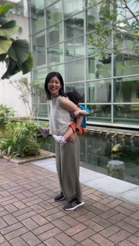 Moeko in Singapore with her daughter